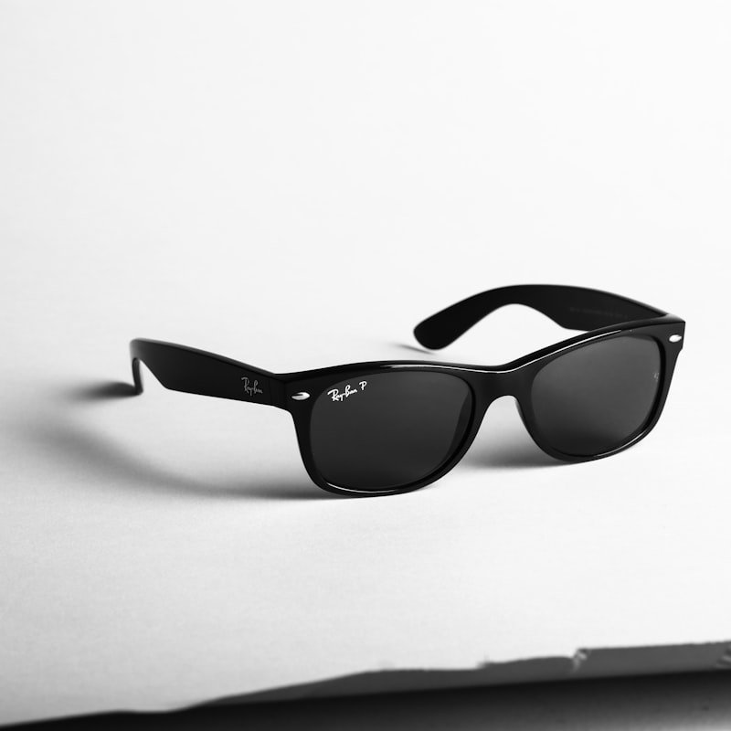 Close-up of invisible ink glasses showing the specialized UV filter lenses